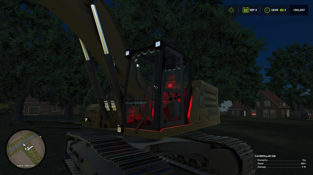 FS25 mod CAT 336 NextGen EDIT excavator in a nighttime setting.