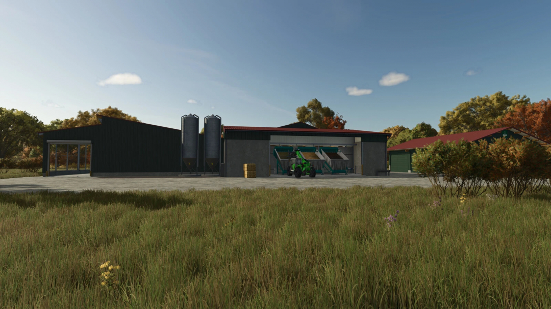 FS25 mod Cow Barn Big With LIZARD Mixfeeder in Farming Simulator 25, featuring large barn with feeders and silo in a pastoral setting.