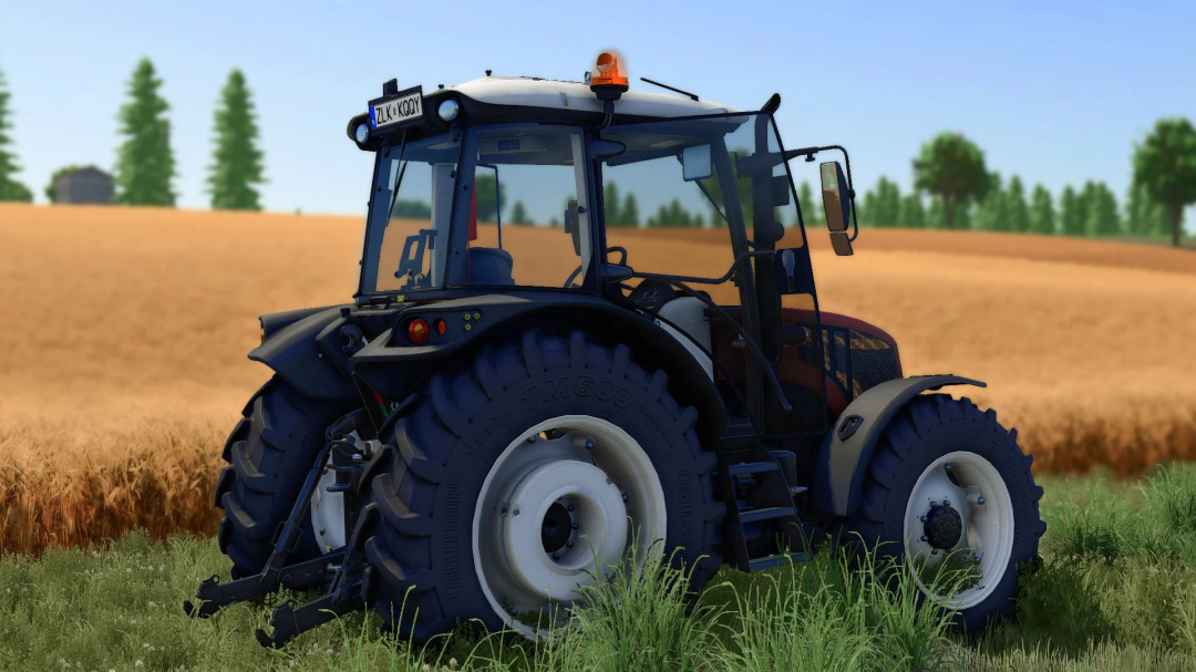 Erkunt 100-110 tractor mod in FS25 on a golden wheat field.