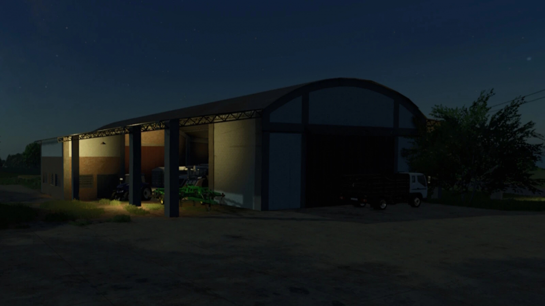 Estancia Lapacho Barn in FS25 mod, illuminated at night with farming equipment inside.