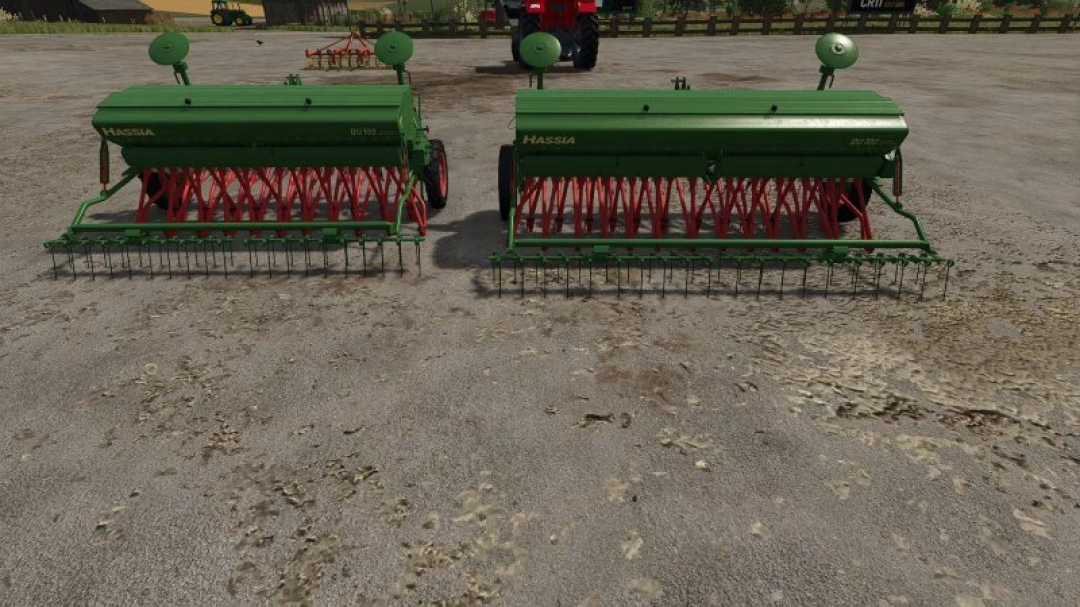 FS25 Hassia pack v1.0.0.0 showing two green seed drills on a farm in Farming Simulator 25.