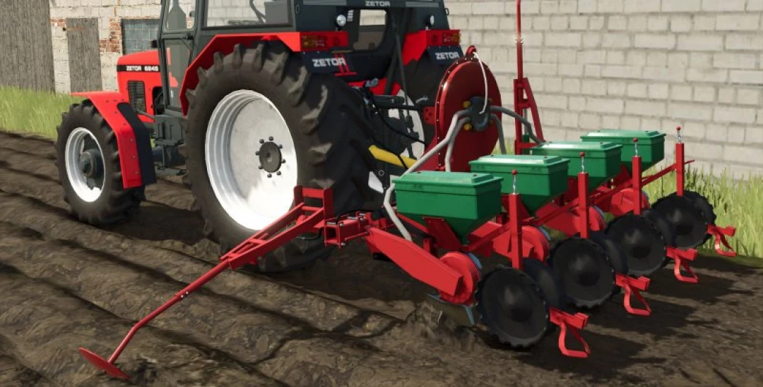 FS25 MEPROZET S100 mod in Farming Simulator 25, showing a red tractor with green planters and black wheels in a field.