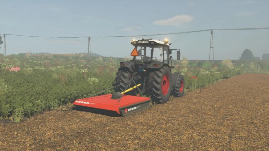 Tractor using FS25 Ursus KROZ/1 mod on a field in Farming Simulator 25.