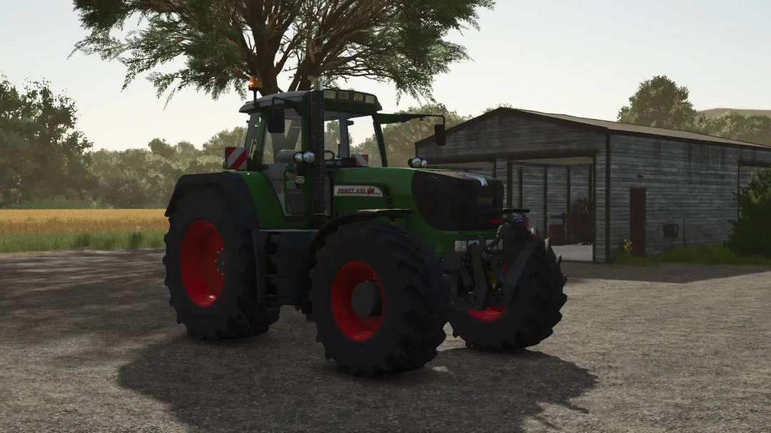 Fendt 900 Vario TMS tractor mod in FS25, parked near a barn.