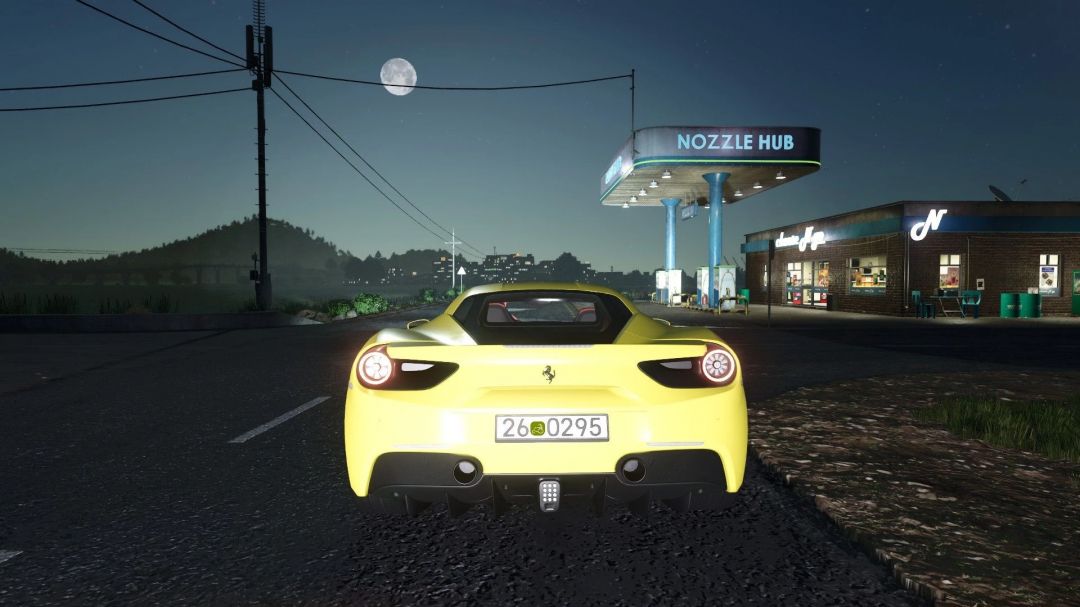 Ferrari 488 GTB mod in FS25 parked by a gas station at night.