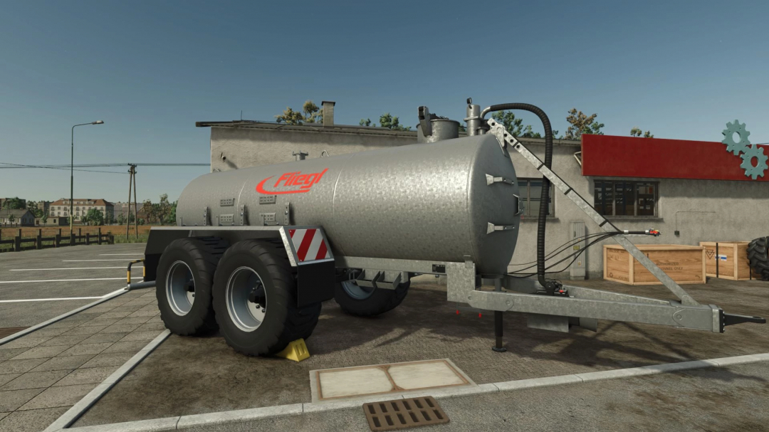 Fliegl VFW 14000 mod in FS25, featuring a large silver tank trailer in a farm setting.