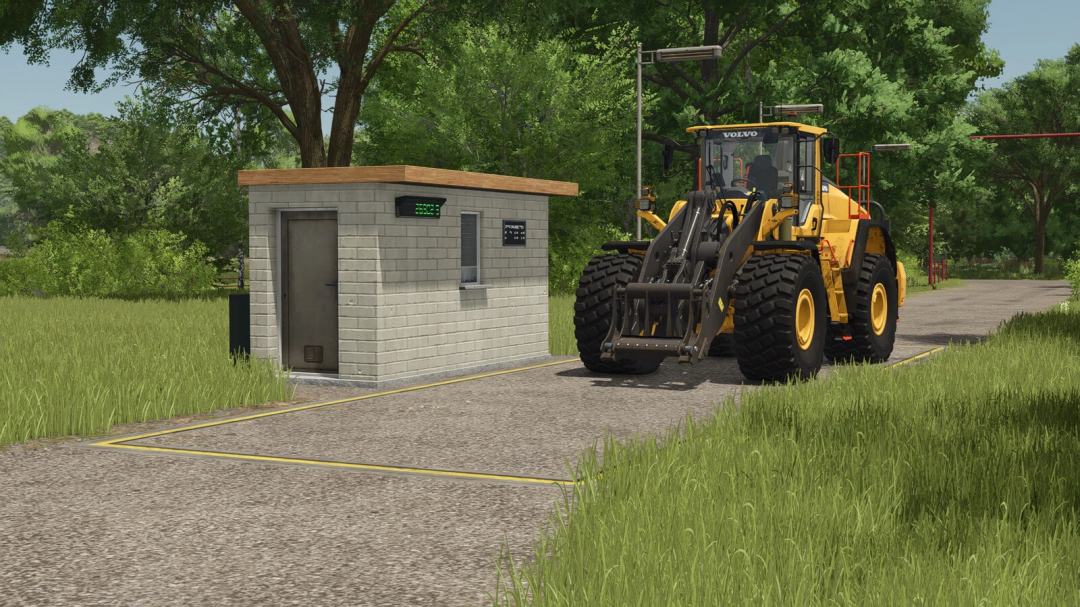 FS25 mod: Floor Plane Weighing Station with a yellow loader in Farming Simulator 25.