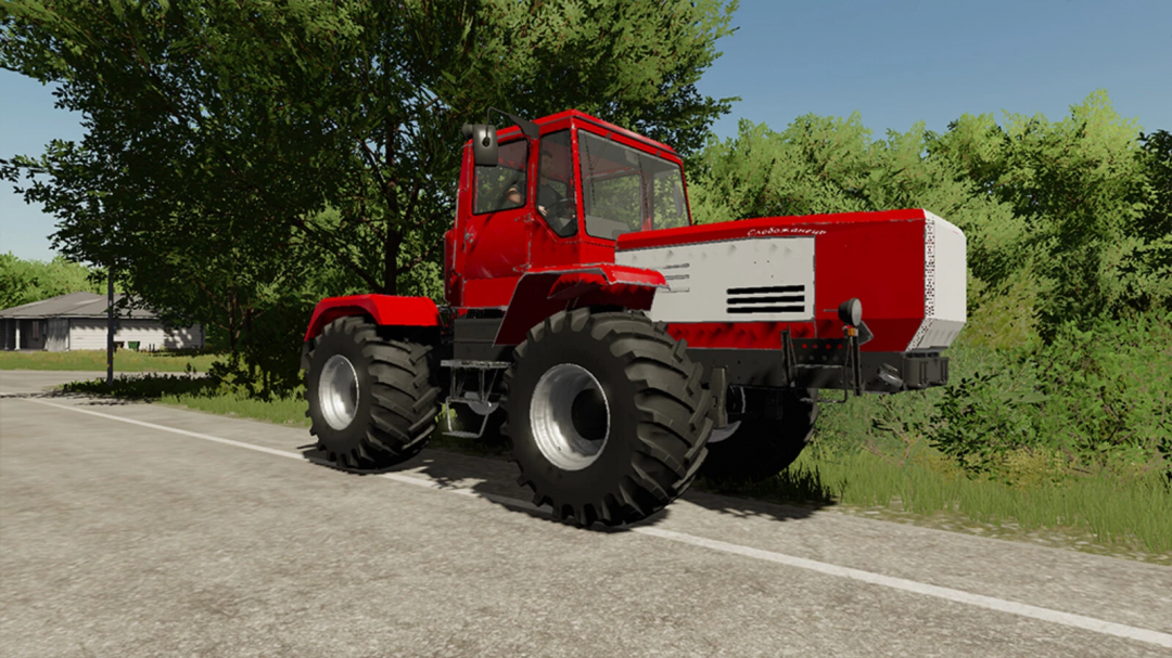 Red HTA 250 tractor mod for FS22 parked on a road in Farming Simulator 22.