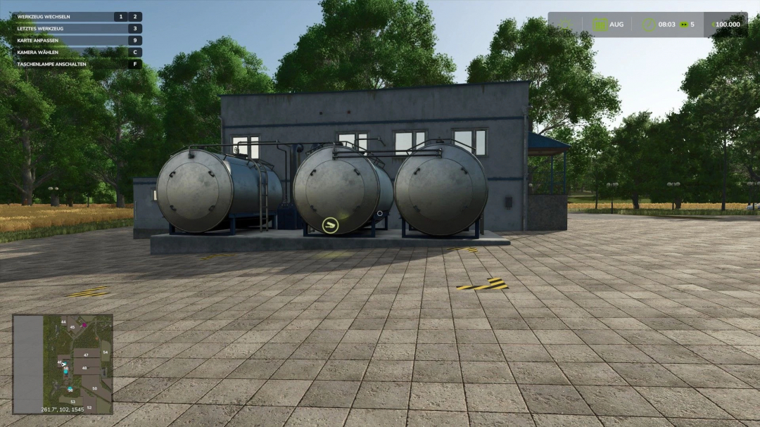 FS25 mod HermannsEck v1.1.0.0 showing industrial tanks in a rural setting.