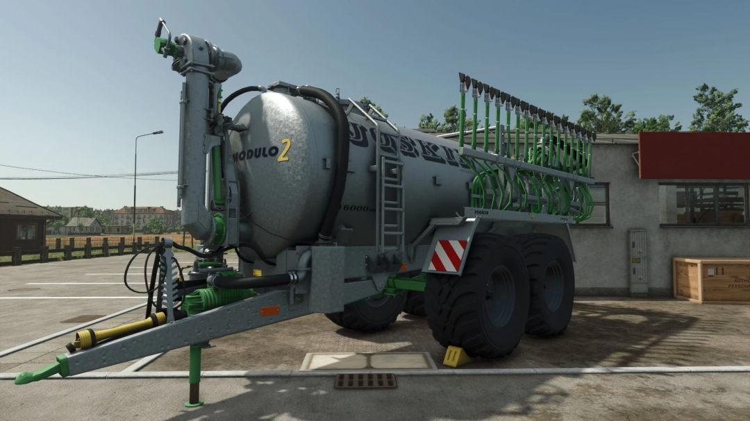 FS25 mod Joskin MODULO 2 v1.0.0.0 showcasing a slurry tanker in a farmyard.