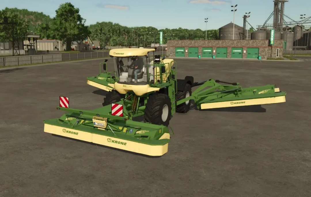 FS25 mod: Krone Big M 500 mower displayed in Farming Simulator 25, showcasing detailed machinery in a farm setting.