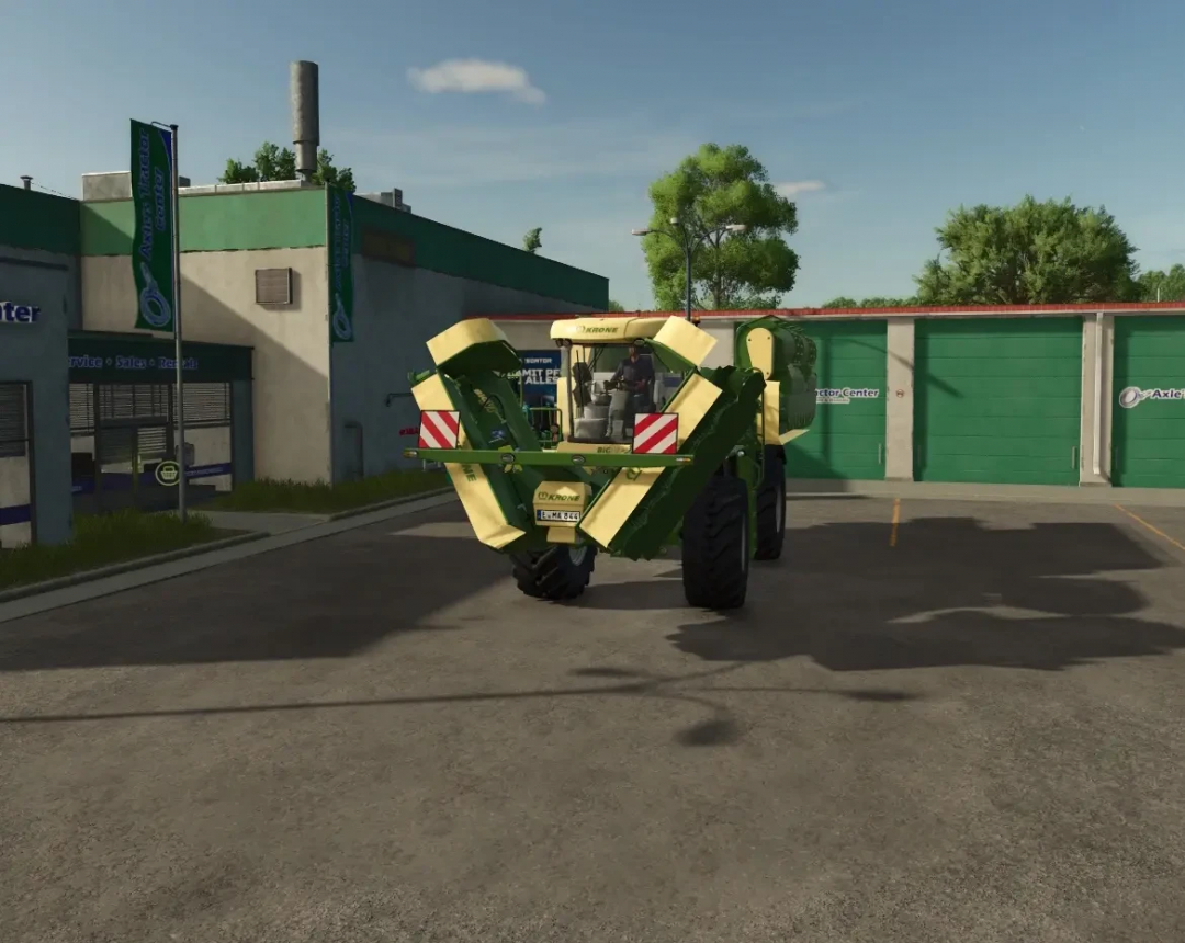 Krone Big M 500 mod for FS25 showcased outside a service center.