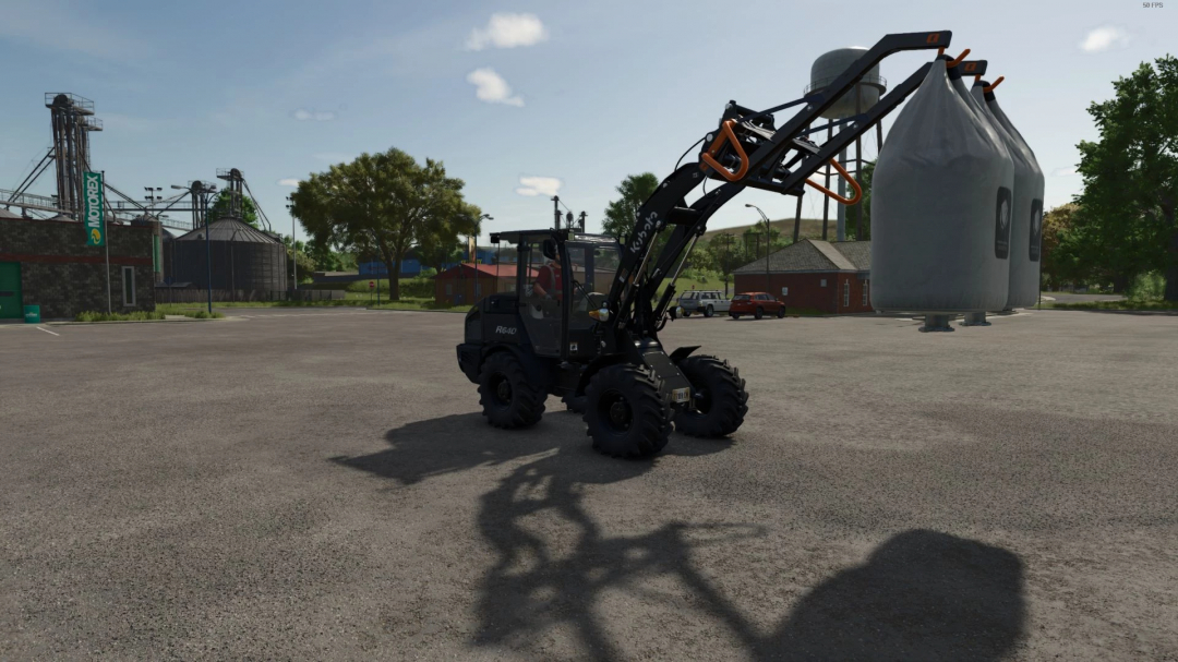 Kubota R640 Edited mod in Farming Simulator 25, featuring an upgraded loader in a farm setting. FS25 mods enhance gameplay.