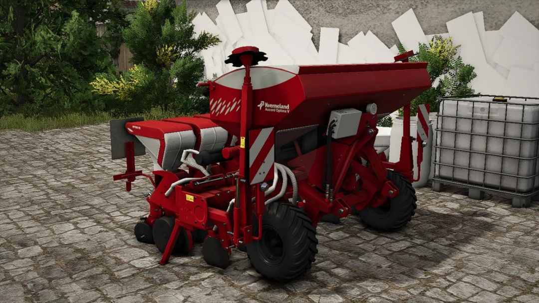 Red Kverneland Optima V planter mod for FS25, displayed on a stone patio.