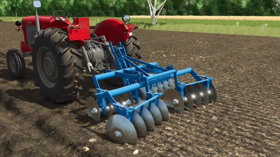 FS25 mod Lizard OLT v1.0.0.0 showing a red tractor with blue disc harrow on farmland.