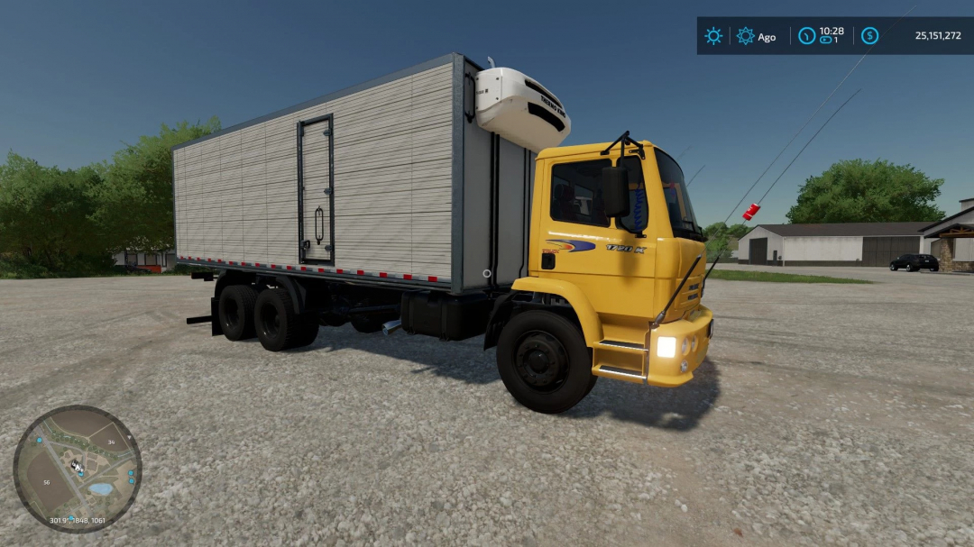 Yellow Mercedes 1720 truck mod for FS22 parked in a farmyard.