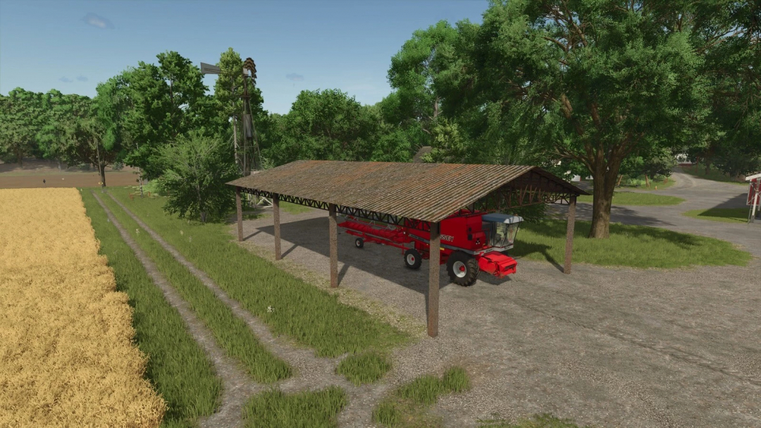 Old Brazilian Shed mod in FS25 with a red harvester parked, surrounded by trees and fields.