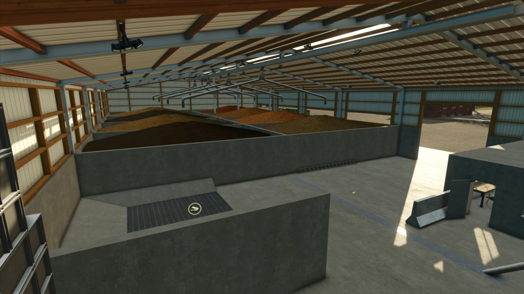 Interior view of Rudolf Hoermann Silo mod in FS25, showcasing grain storage bins in a spacious barn.