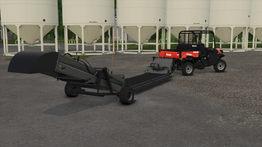 FS25 mod Soaring Eagle SA30 Drive-Over Conveyor with vehicle and silos in the background.