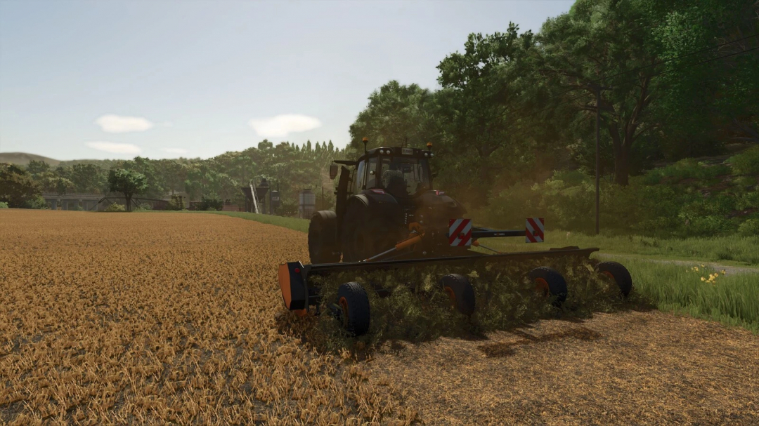 FS25 mod TMC Cancela TJP610 in use on a farm field, showcasing a tractor and lush surroundings.