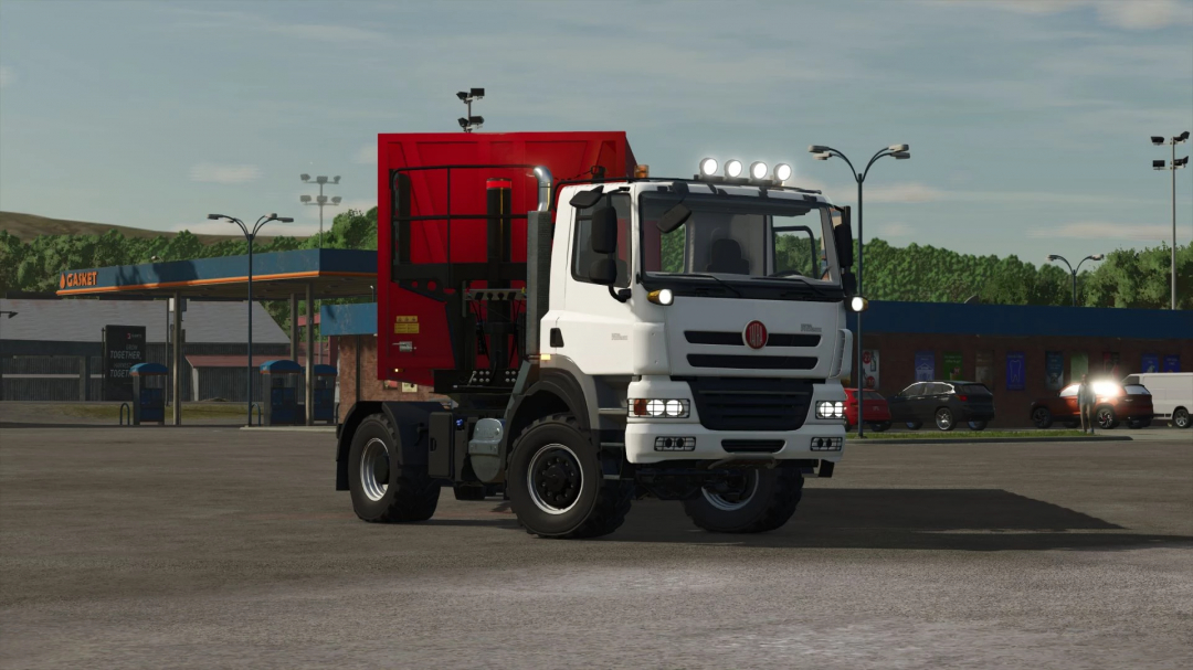 Tatra Phoenix 4x4 truck mod in FS25 at a gas station. Farming Simulator 25 mods.