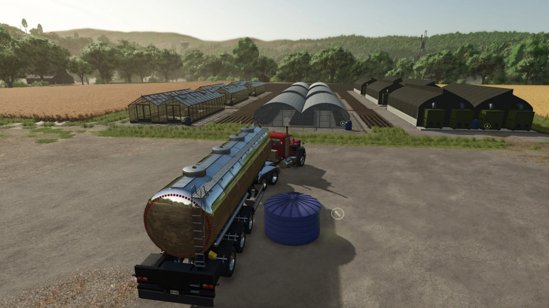 FS25 mod Water Distributor v1.0.0.0: a truck with a water tank near greenhouses and fields in Farming Simulator 25.