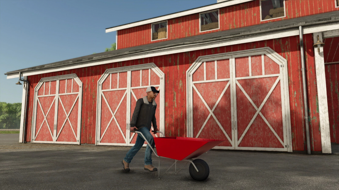 Player using Wheelbarrows mod v1.0.0.0 in FS25 in front of a red barn.