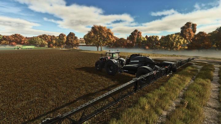 fs25-mods,  FS25 mod Amazone UX 5201 Super on a field with autumn trees in Farming Simulator 25.