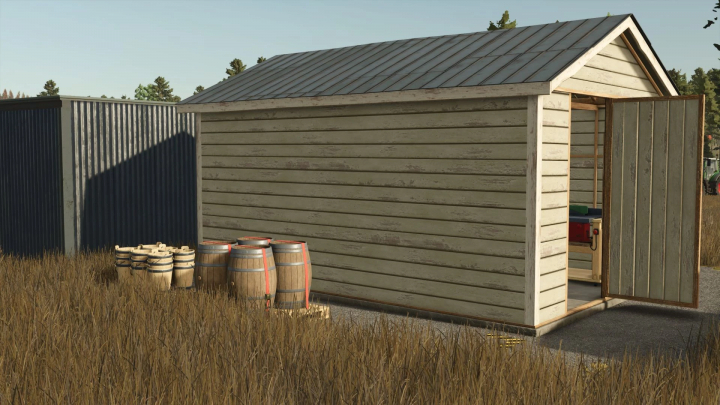 fs25-mods, Backyard Productions LVL2 mod in FS25 featuring a wooden shed with barrels and buckets outside.