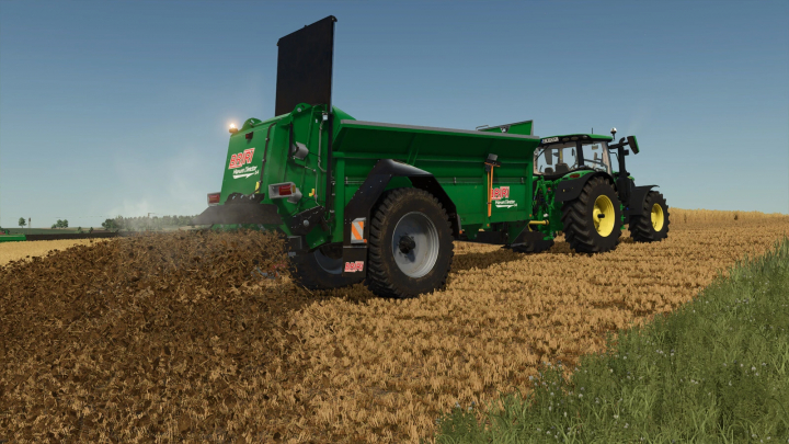 fs25-mods,  FS25 mod Briri Manure Director 14 spreading manure on a field in Farming Simulator 25.