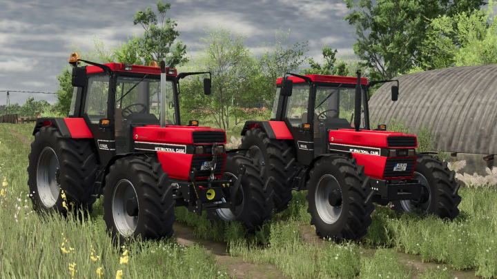 fs25-mods,  Case IH 56 Series tractors in FS25 mod, showcasing two red tractors on a farm landscape.