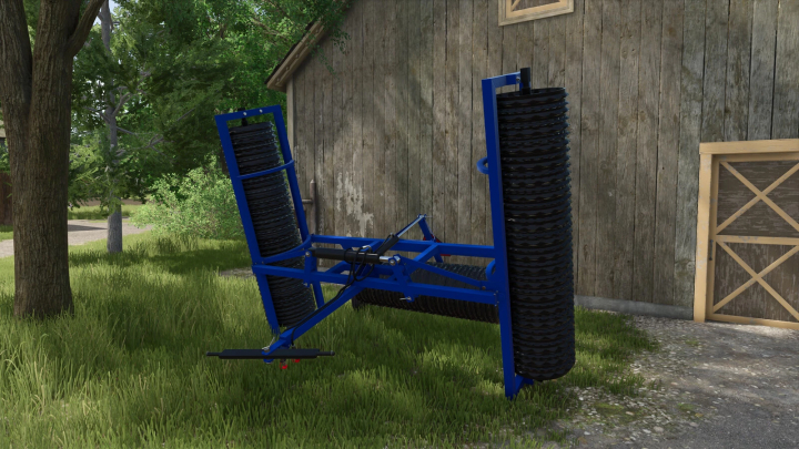 fs25-mods, FS25 mod Dalbo Hydraflex 5.2 v1.0.0.0, a blue farm implement, beside a barn in Farming Simulator 25.