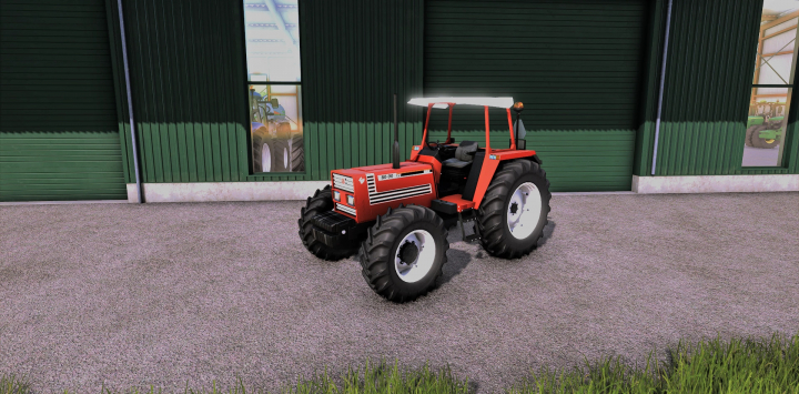 fs25-mods,  Fiat 70-66 tractor mod parked outside a green building in Farming Simulator 25.