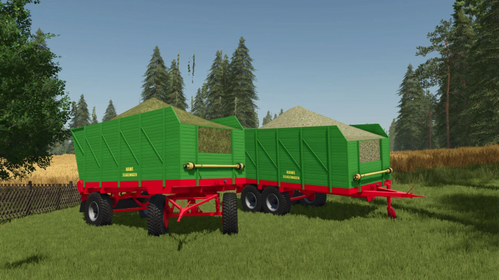 fs25-mods,  FS25 Hawe SLW 20 trailers loaded with forage in a field, part of the Farming Simulator 25 Hawe SLW 20 Pack v1.0.0.0 mod.