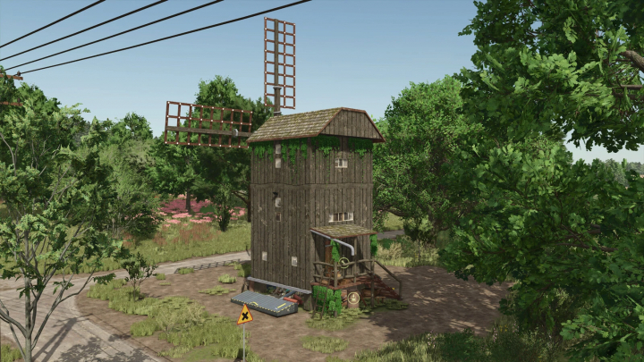 fs25-mods,  Old Grain Mills mod for FS25, depicting a rustic windmill surrounded by lush greenery.