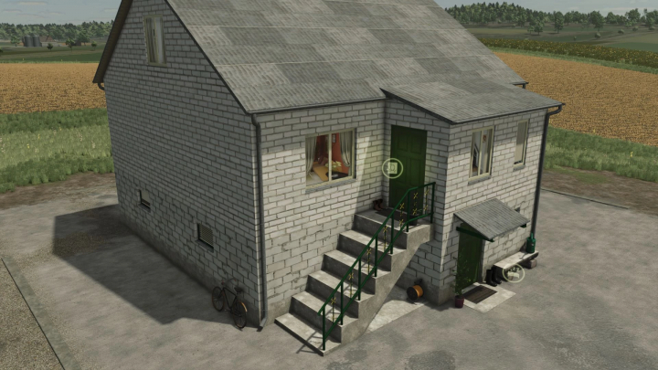 fs25-mods,  Old brick farmhouse mod in FS25 with green doors and outdoor stairs, set in a rural landscape.