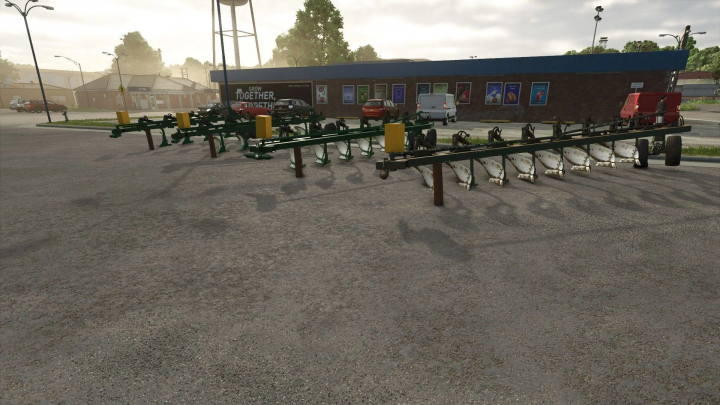 fs25-mods, PHX Pack v1.0.0.1 equipment in a parking area in FS25 mods.