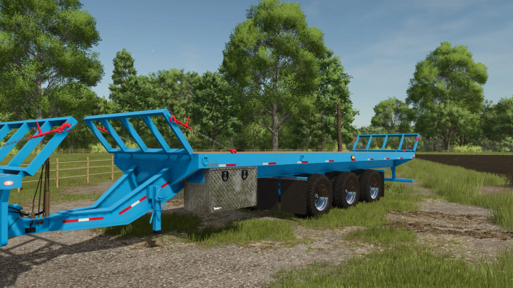 fs25-mods, TL25 Pacesetter FlatBed Trailer mod for FS25, showcasing a blue trailer in a lush green farm setting.