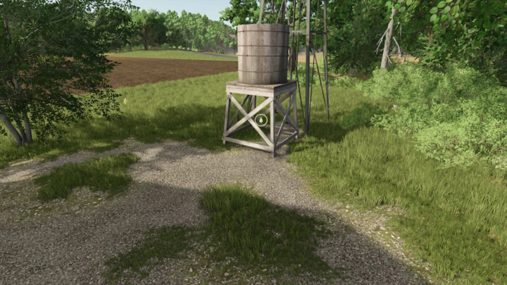 fs25-mods,  Wooden water tank in FS25 Unload Zones Pack mod, surrounded by trees and grass.