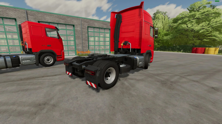 fs22-mods,  Volvo FH3 truck mod for Farming Simulator 22, showcasing a red cab and detailed rear chassis in an industrial setting.