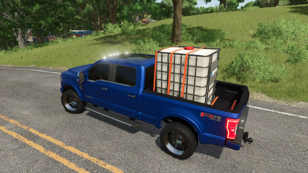 FS25 mod 2019 F250 Limited v1.0.0.1, blue pickup truck with water tank on rural road.