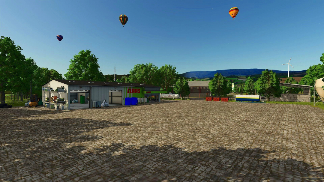 FS25 mod Au Fil des Saisons v1.0.0.0: farm area with equipment and hot air balloons in the sky.