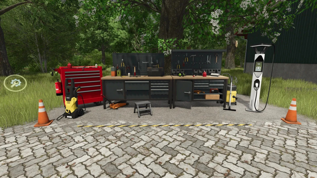 FS25 mods: Automated multifunctional workshop v1.0.0.3 with tools, cabinets, and charging station in a forest setting.