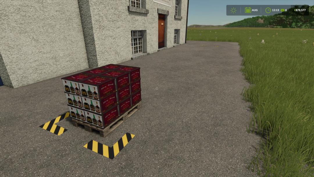 FS25 mod image: Pallets of brandy outside a production building in Farming Simulator 25.