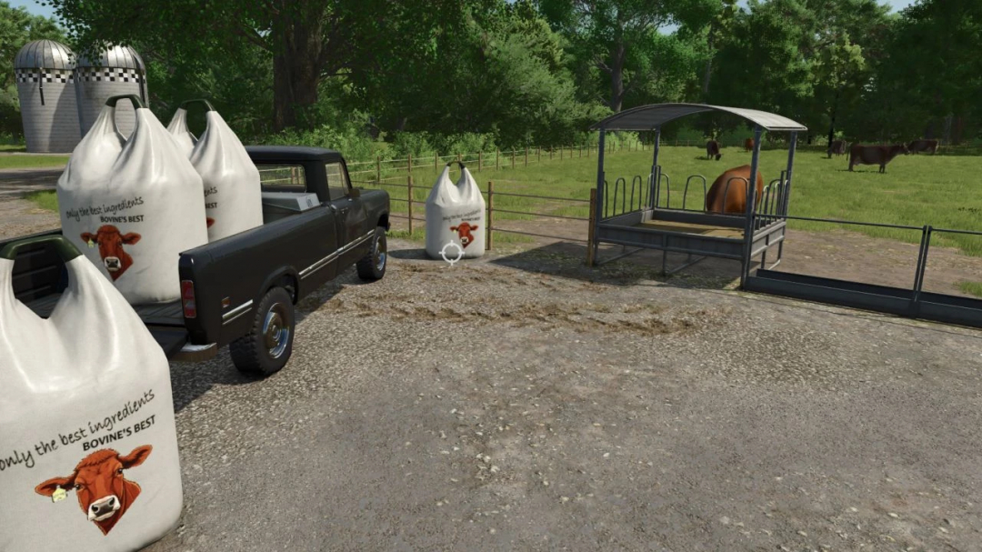 FS25 mod image showing Bovine's Best TMR big bags loaded on a truck near a cow feeder.