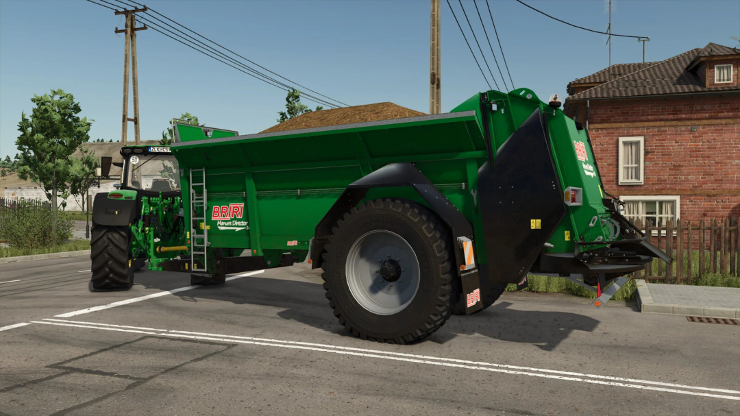 Briri Manure Director 14 mod for Farming Simulator 25 displayed on a street, showcasing its green design and functionality.