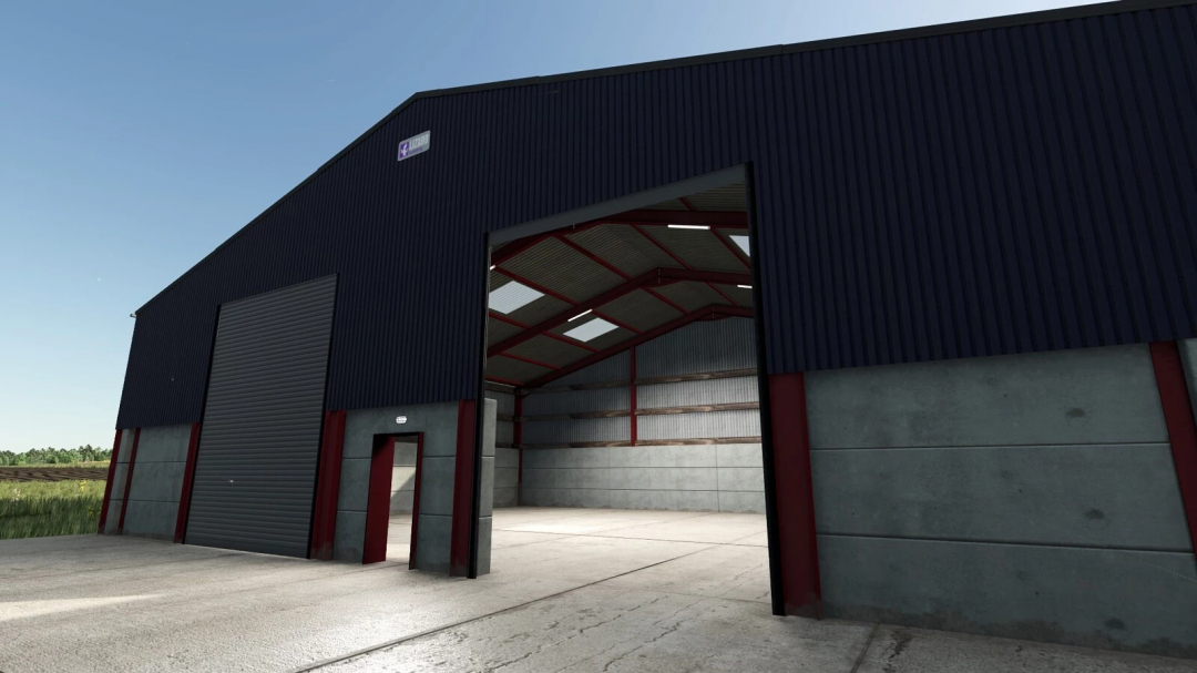 FS25 British Grain Shed mod, showcasing a large metal storage building with open doors, under a clear sky.