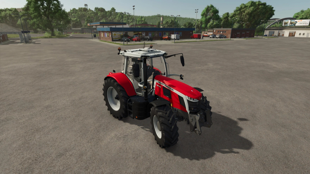 Red tractor in a parking lot, showcasing Camera Hotkeys mod in FS25.