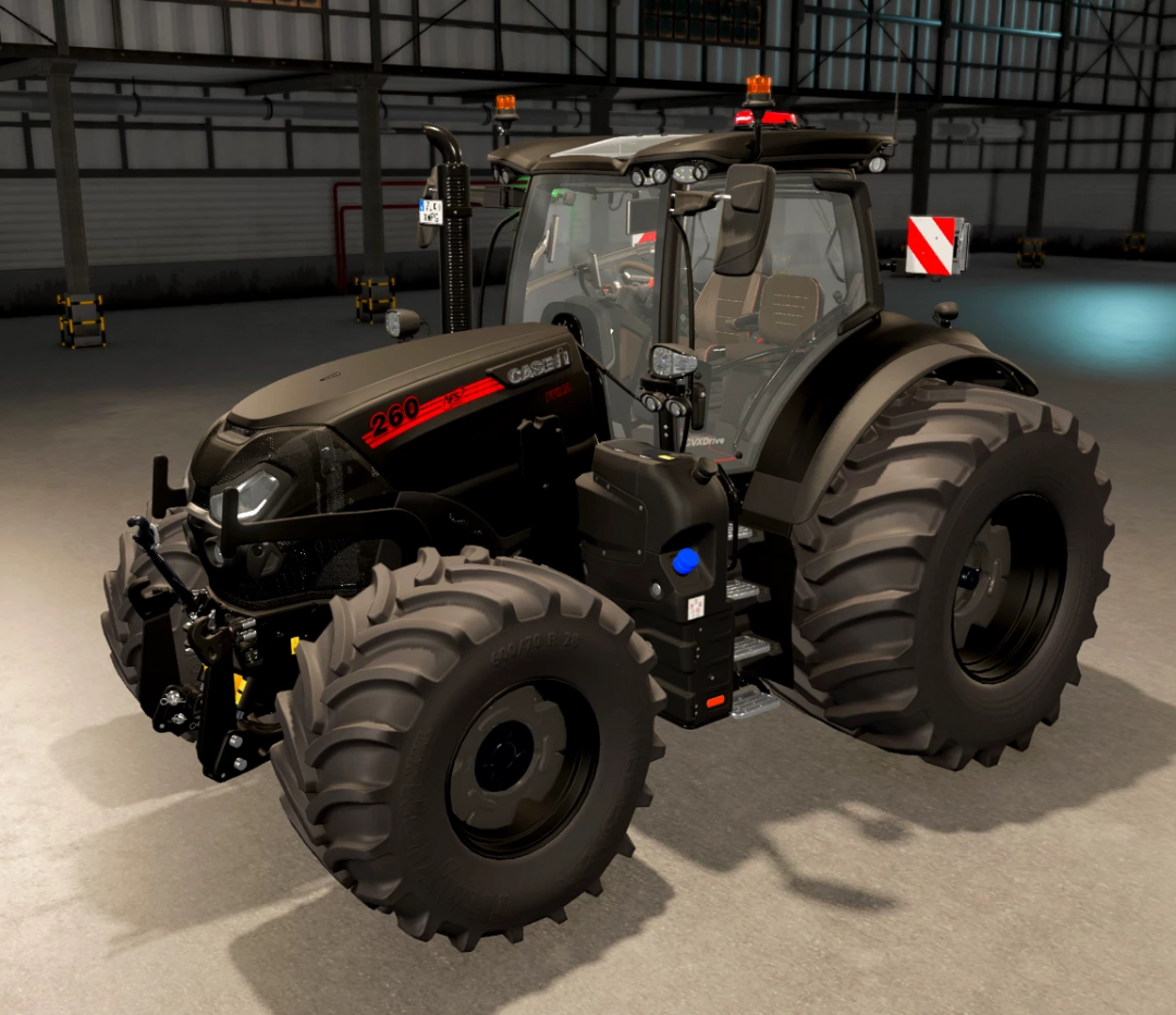 CaseIH Puma Edit v1.0.0.0 mod for FS25 featuring a black tractor in a garage.