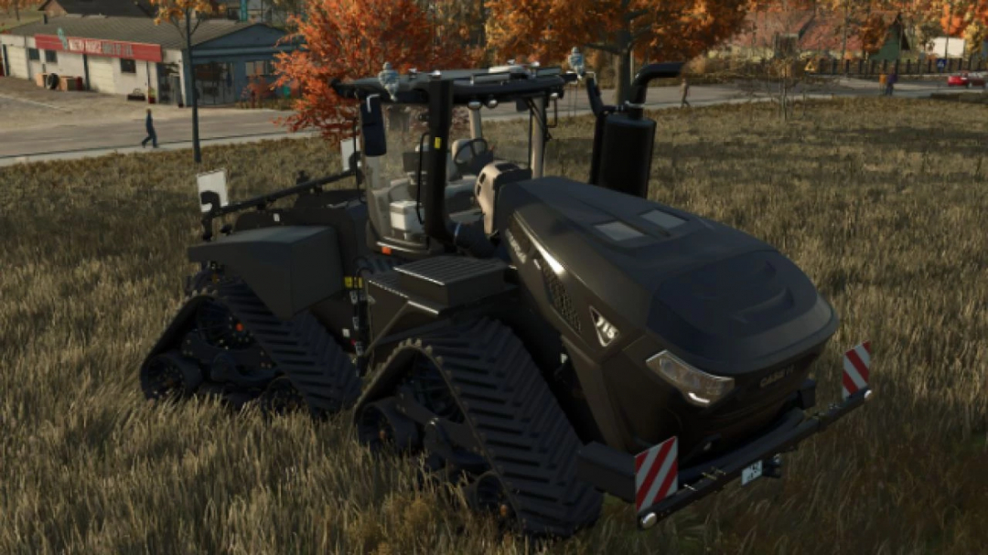 Case IH Steiger 715 Quadrac FS25 mod in a grassy field, showcasing its powerful design.